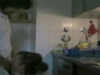 Sexually aroused Couple Having sex In The Kitchen